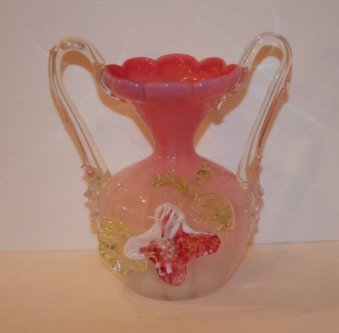 Stevens and Williams Glass Vase: Ribbed glass vase. Applied handles and flowers; 7in. H. x 6.5in. W.