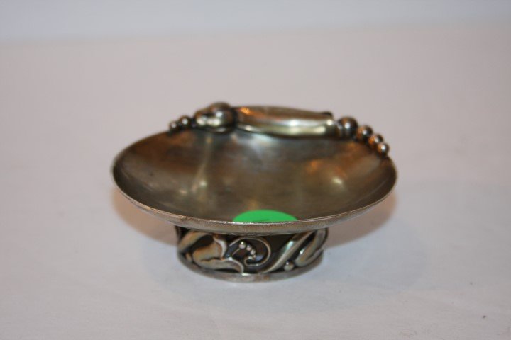 George Jensen Sterling Silver Nut Dish: Sterling silver nut dish. Reticulated floral base; 1.25in. H. x 3.25in. W.