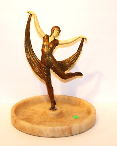 Art Deco Bronze and Ivorine Grouping: Cold painted bronze dancer with ivorine armsand head. Alabaster centerpiece base; 12.5in. H. x 10in. W.