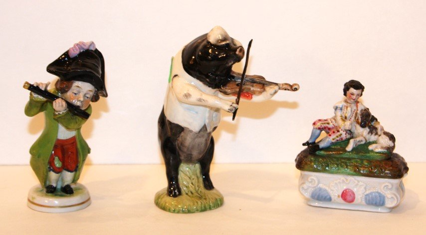 Three(3) Porcelain Figurines: Pig palying violin, fife player, porcelain covered trinket box; 3.5in. H. -5in. H.