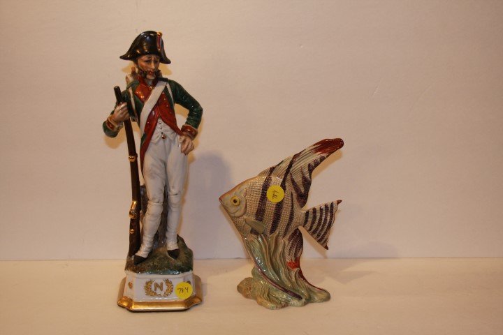 Two(2) Porcelain Pieces: Capodimonte porcelain soldier, 12in. H.; Beswick porcelain fish, 7.5in. H.