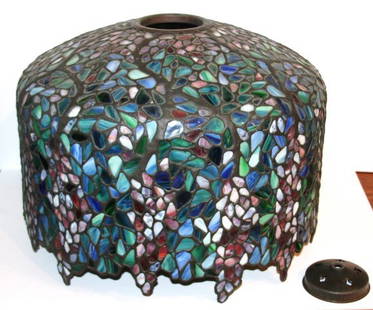 20th C. Leaded Wisteria Lamp: Leaded glass Wisteria design lamp shade. Fitted cap; 13.5in. H. x 18.5in. D. (no base)