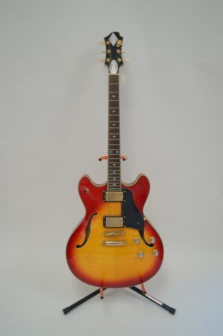 1960's Xavier Hollow Body Electric Guitar: Sunburst yellow to red color. 42.5in. L.