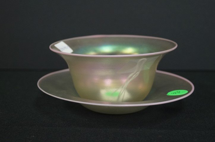 Steuben Art Glass Bowl and Underplate: Irridescent glass bowl and underplate; 2.5in. H. x 5in. D.(bowl), 6.25in. D. (underplate)