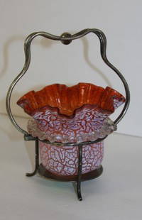 Victorian Silverplate and Glass Condiment: Orange crackle glass bowl. Ruffled rim. Silverplate holder(slight chipps); 6.25in.H. x 5in.W.