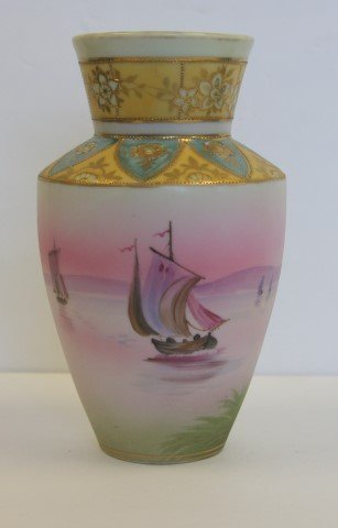 Nippon Scenic Porcelain Vase: Hand painted scenic porcelain vase. Decorated with a seascape with ships. Marked at the underside; 7.5in.H. x 4in. W.