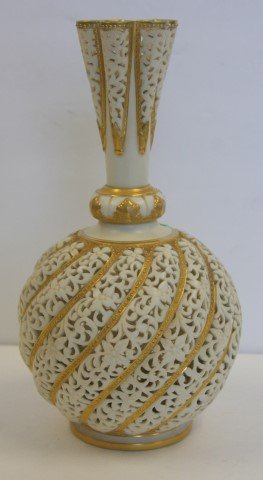 Royal Worcester Porcelain Vase: Reticulated porcelain vase. Bulbous form. Gilt decoration. Marked at the underside; 8.5in. H. x 5in. W.