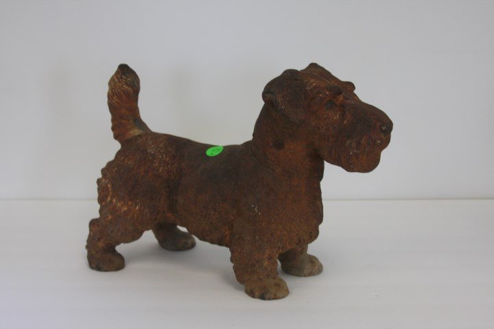 Antique Cast Iron Doorstop: Cast iron Scottie dog. Partial paint; 9.5in.H. x 13in.L.