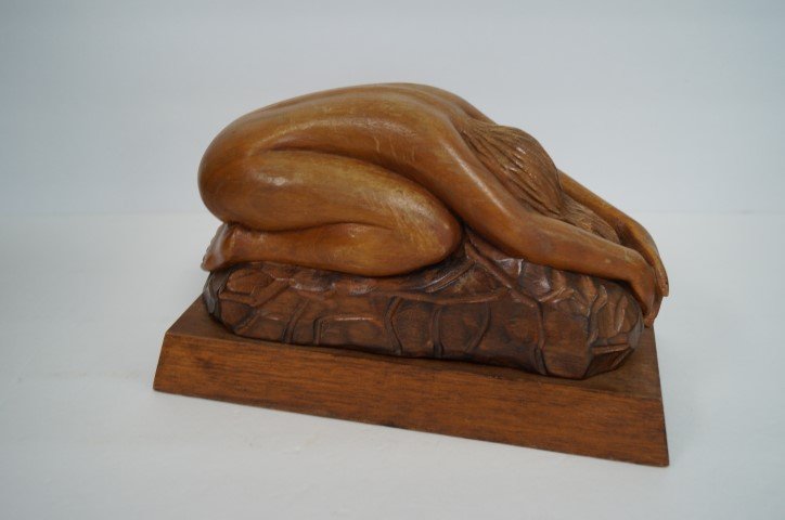 Jose Pinal; 20th C. Latin American Wood Carving Signed: Carved wood figure of a crouching nude woman. Artist signed ; 6.5in.H. x 10.5in.W.