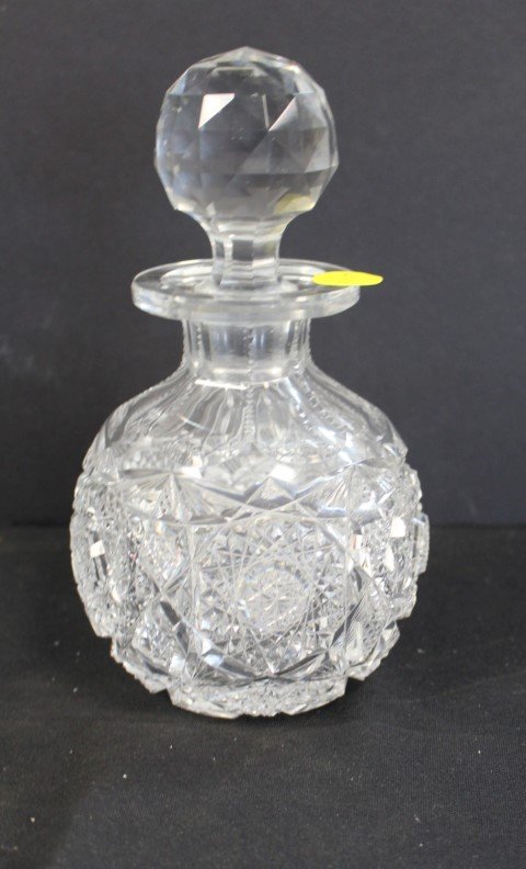 Cut Glass Dresser Bottle with Stopper: fine cut rosettes all around, glass stopper, size 7.5 h., 4.25 w.