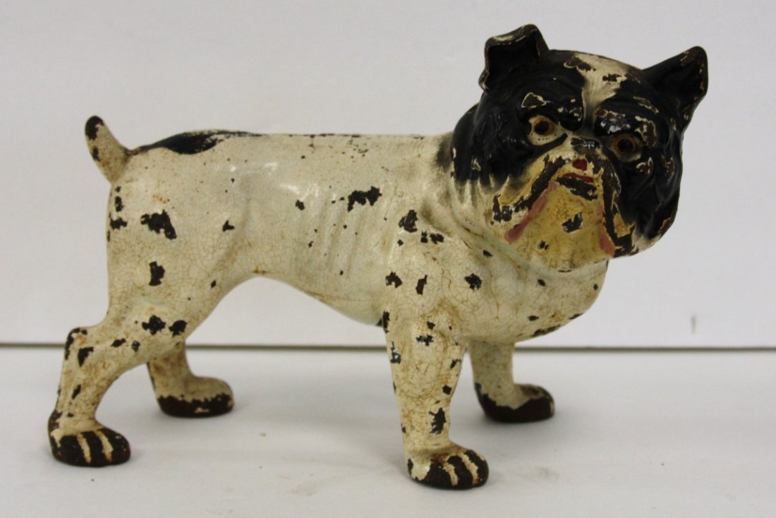 Painted Cast Iron Bulldog Doorstop: Cast iron doorstop. Standing bulldog. Original paint; 6in.H. x 9in.W.