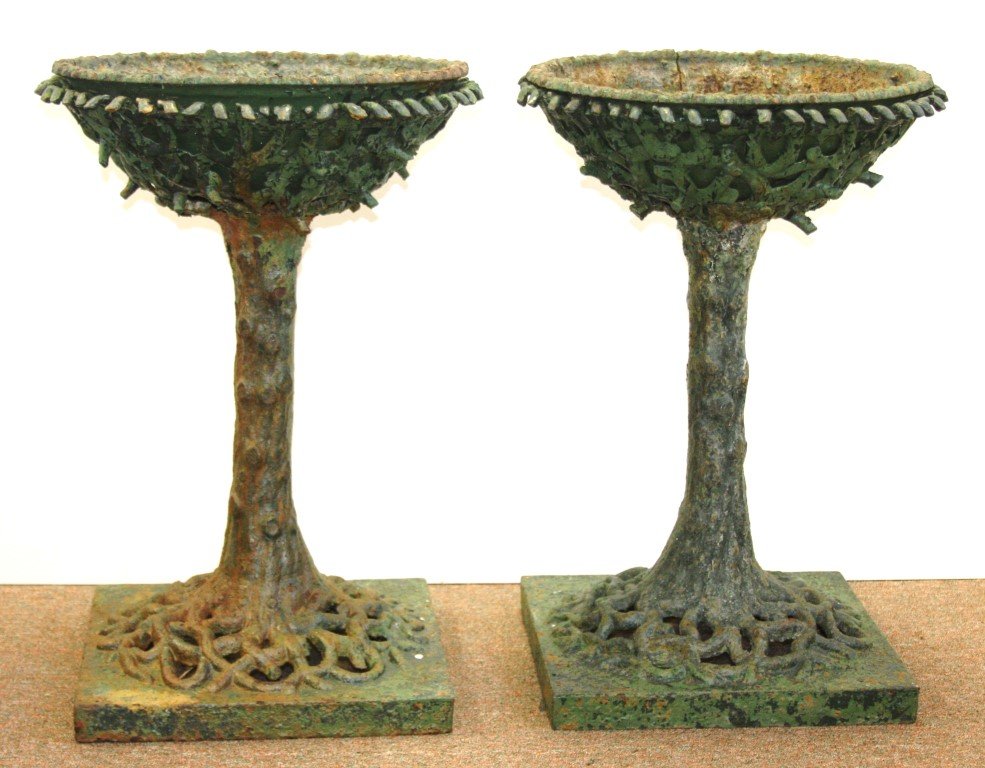 Gustave Eiffel; Pair of 19thC. Cast Iron Plant Stands: Pair of 19th century cast iron plant stands. Braided vine design. Attributed to Gustave Eiffel; 26.5in.H. x 17in.W. x 16in.D. Miller Iron Works