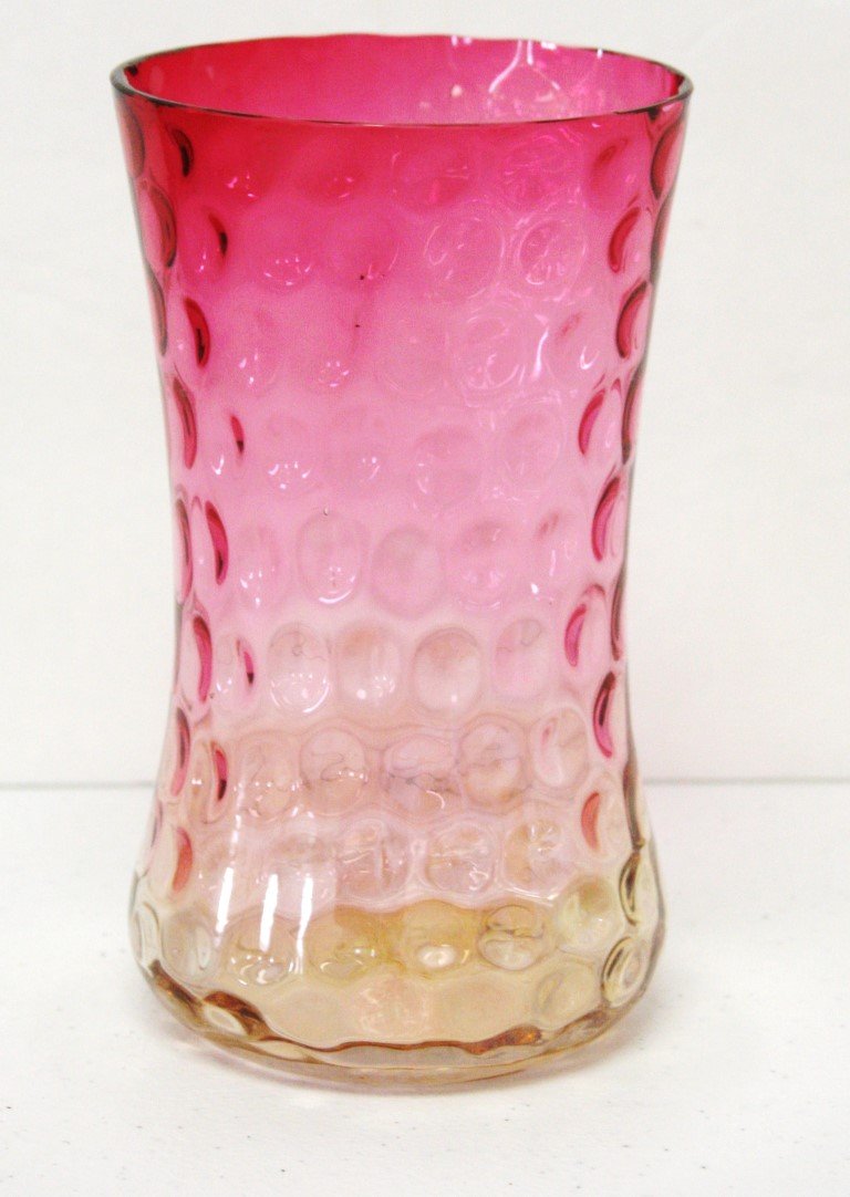 Amberina Glass Vase: Amberina glass vase. Beaker form. Coinspot decoration; 6.5in.H. x 3.75in.W.