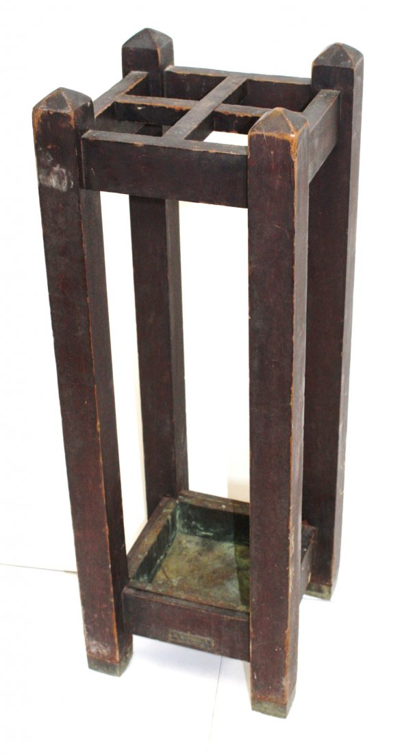 German Mahogany Mission Umbrella Stand: Mahogany umbrella stand. Plaquard reads The Globe Wernicke Co.; 28in.H. x 10in.W.