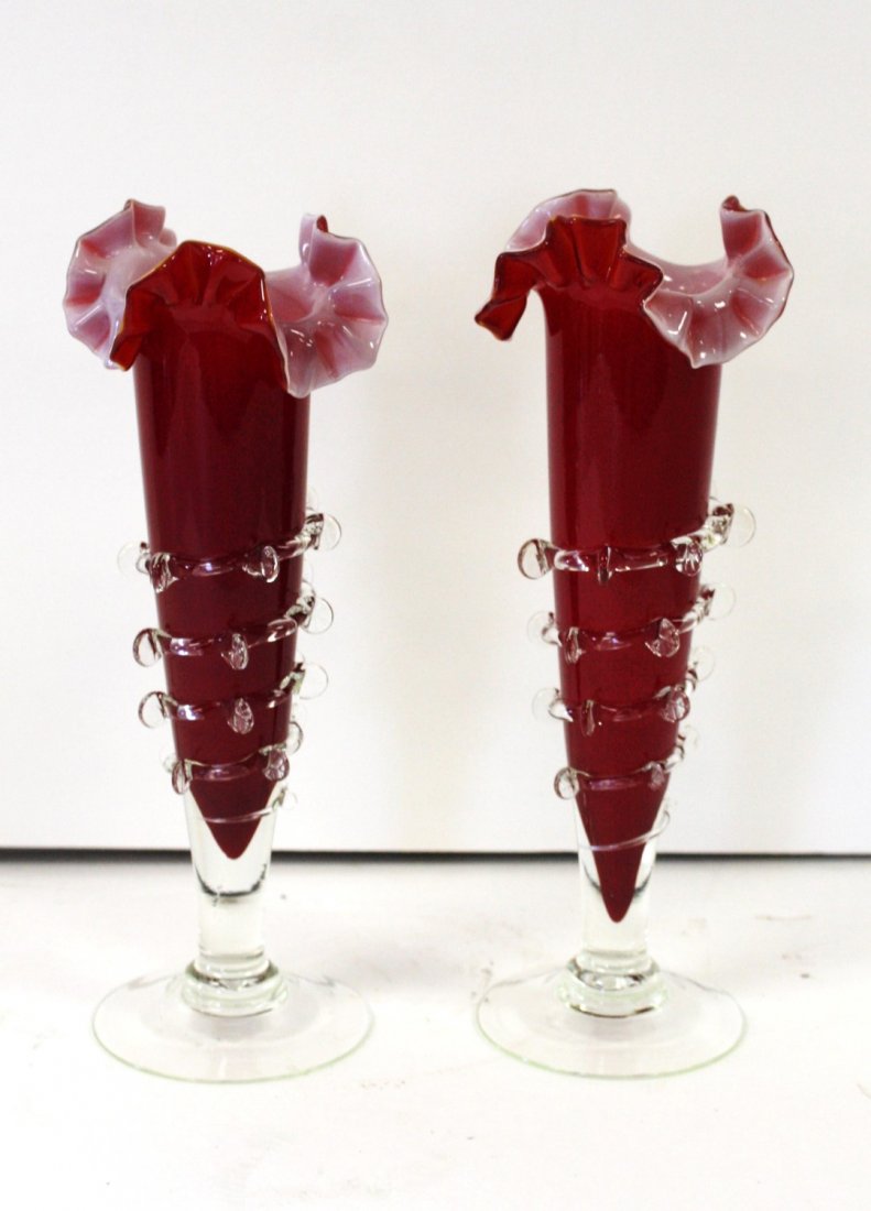 Pair of Stevens and Williams Glass Bud Vases: Pair of red cased glass bud vases. Applied glass decoration; 9.5in.H.