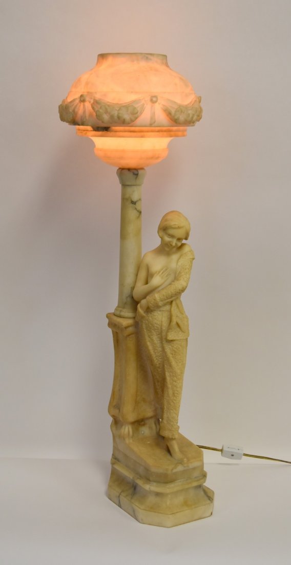 G. Dello Sbarba & Figli; Art Deco Italian Figural Lamp: Alabaster and marble figural lamp. Semi nude girl beneath a street lamp. Inscribed "G. Dello Sbarba & Figli, Volterra(P.Pisa) Italy"; 28in.H. x 7in.W.