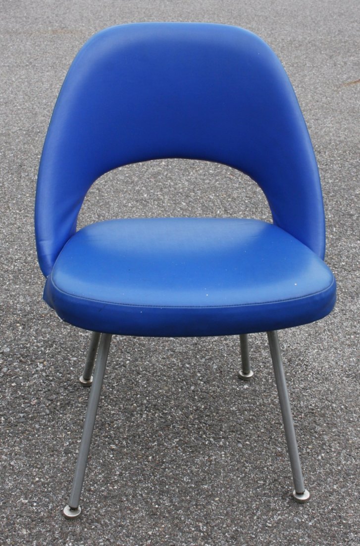 Knoll Associates Eero Saarinen Executive Chair: Blue vinyl upholstered executive chair. Steel legs. Designed by Eero Saarinen for Knoll. Labels at the underside; 31.5in.H. x 21.5in.W.