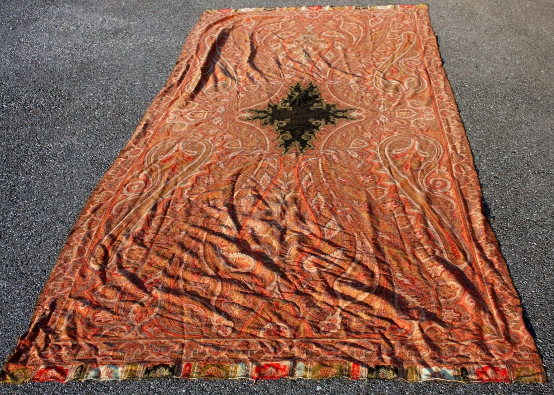 Large Antique Paisely Coverlet: Antique paisely coverlet. Black center medallion; 124 inches length x 58 inches wide