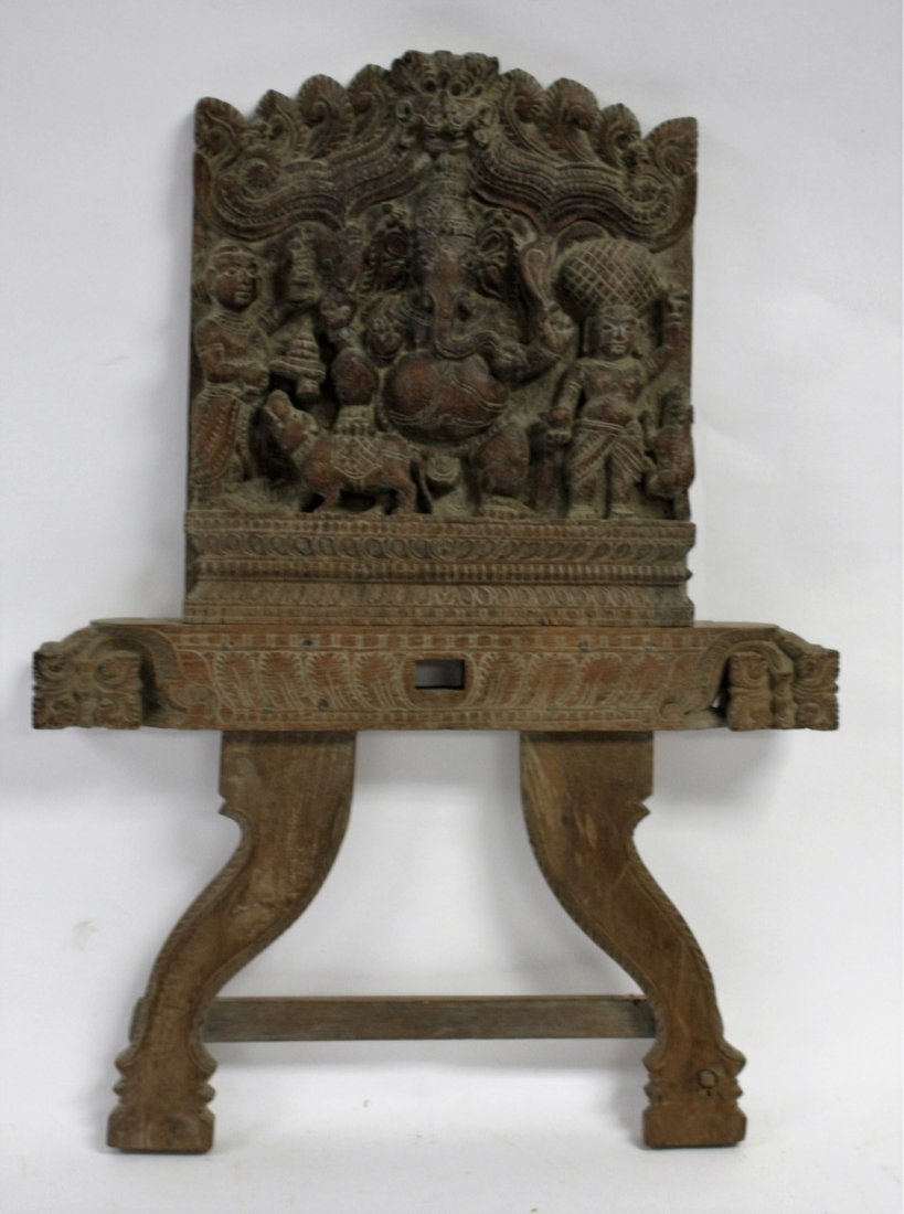 Early Indonesian Carved Wood Bracket: Heavily carved teakwood bracket. Decorated with figures and ganesh in a temple setting; 24in.H. x 17in.W.