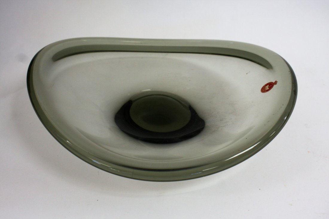 Holmegaard Mid Century Glass Center Bowl: Smoke glass bowl. Signed at the underside and retains original paper label; 3in.H. x 10.75in.W.