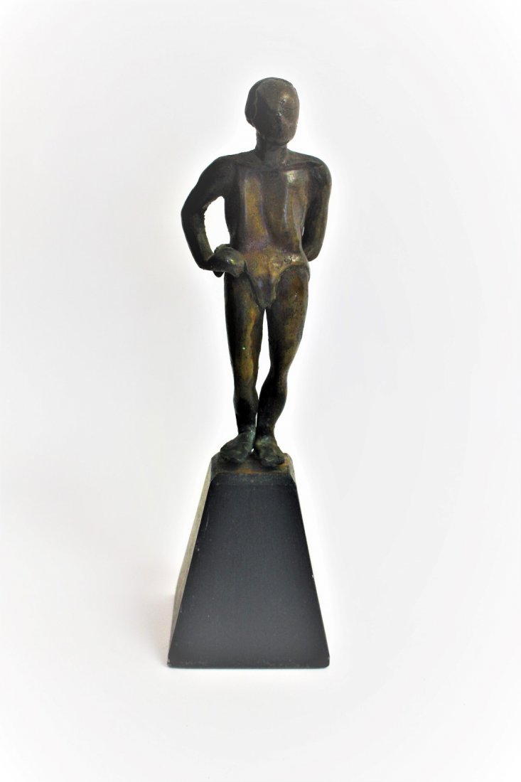 Circa 1950 Bronze Male Sculpture: Circa 1950 bronze male figure sculpture mounted on black wood base, unsigned. Size: 11.5 in. overall height, 7.5 in. height of bronze, 3.25 in. widest at base, 3 in. wide bronze at shoulders