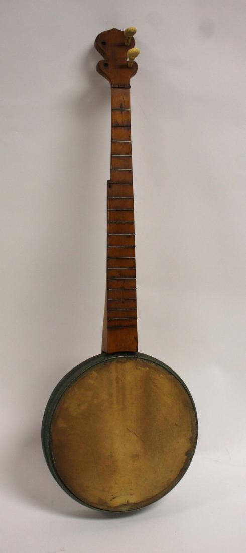 Civil War Era Banjo: Five(5) string with side mount; 32in.H. x 1in.W.