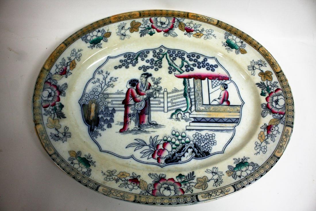 Chinese Export Ironstone Platter: Ironstone platter. Figures in a garden setting; 16.25in. X 20.75in.