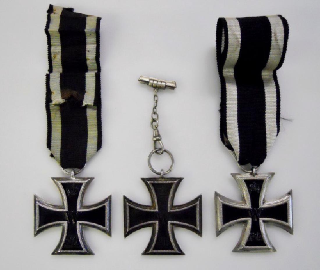 WW1 German Iron Cross 2nd class, (3pc): WW1 Original collection of three German Imperial Iron Crosses 2nd class. Two are accompanied by black and white silk ribbons. All three have magnetic center with crowned "W" and "1914", reverse with o