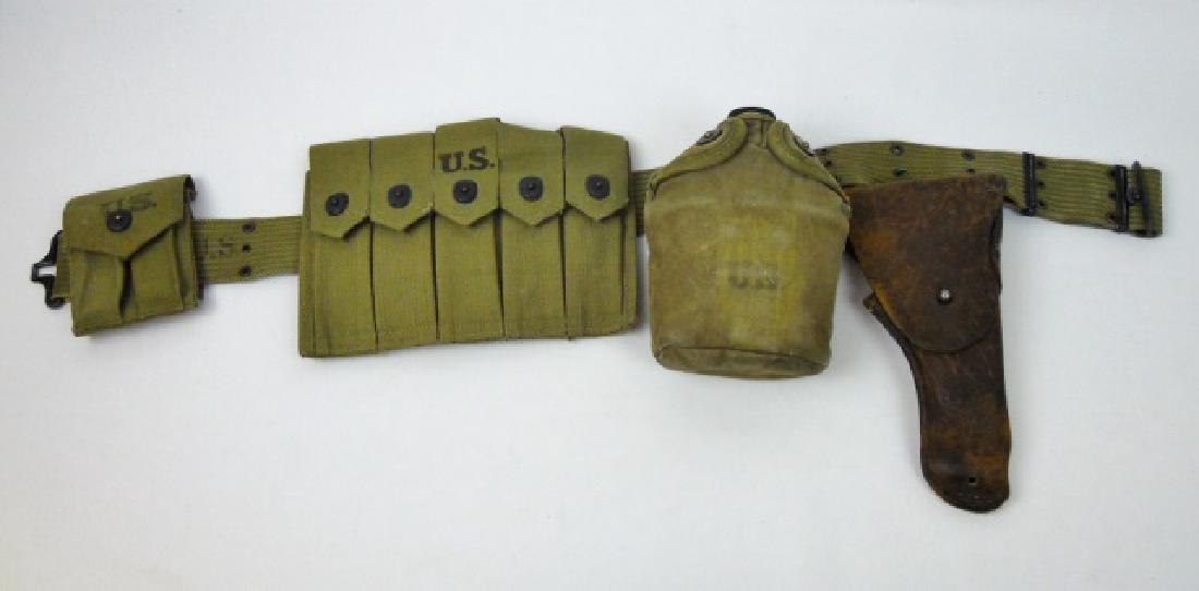 WW2 U.S. Web Belt Rig, (5pc): WW2 Original belt rig, : (1) M1911 .45 leather holster, signed, "U.S. Grafton & Knight Co. 1943, (1) Cotton web .45 cartridge pouch signed, "BOYLE 1942", (1) Cotton web Thompson Machine Gun ammunition