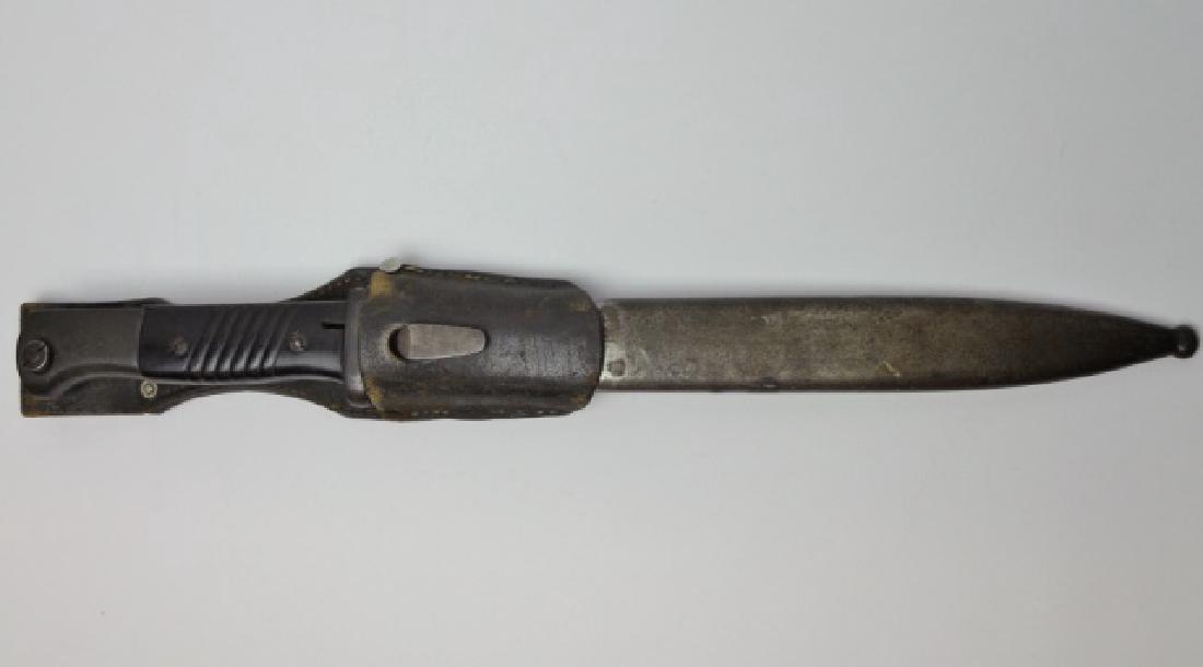 WW2 German K98 Bayonet, 42 CRS, Matching Numbers: WW2 Original K98 Combat Bayonet. 1942 example with ricasso stamped maker code "42 CRS" (Paul Weyersberg). Bakelite grips with blued pommel, guard and single fullered unsharpened blade. Matching serial