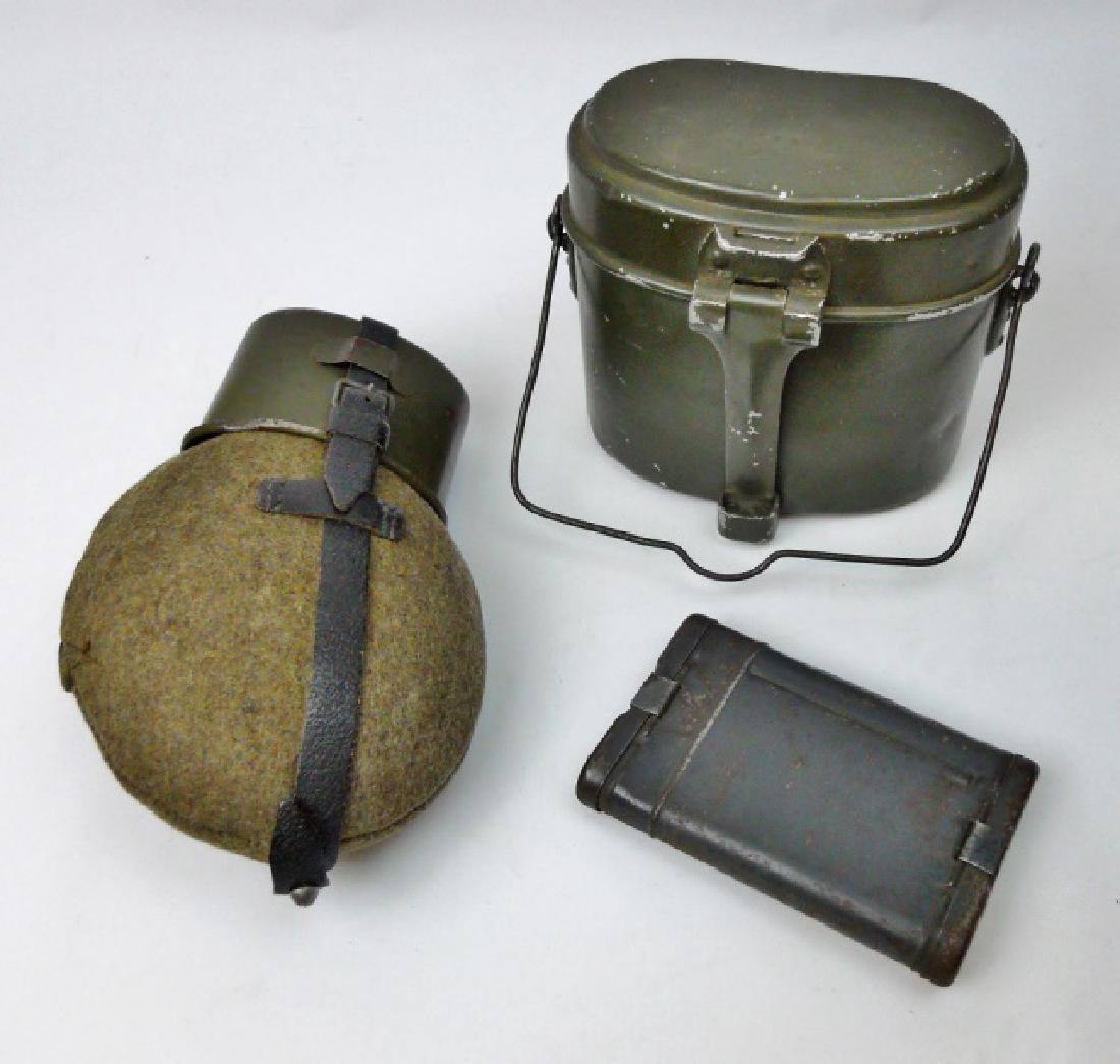 Collection of WW2 German Field Gear, (3pc): WW2 Original German field gear: (1) M1931 canteen, red enamel steel body with Bakelite screw cap, felt cover and painted metal cup with leather suspension harness and clip. (1) M1931 Two piece aluminu