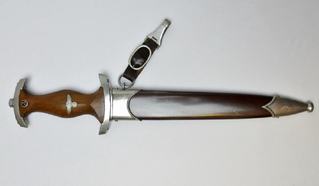 WW2 German M1933 SA Dagger, J. R. SAUER & SOHN: WW2 Original M1933 SA EM/NCO Dagger. Steel blade etched "Alles fur Deutschland" with etched maker mark "J.R. SAUER & SOHN". Solid nickel guard, wood grip with inset eagle with swastika and enamel SA b