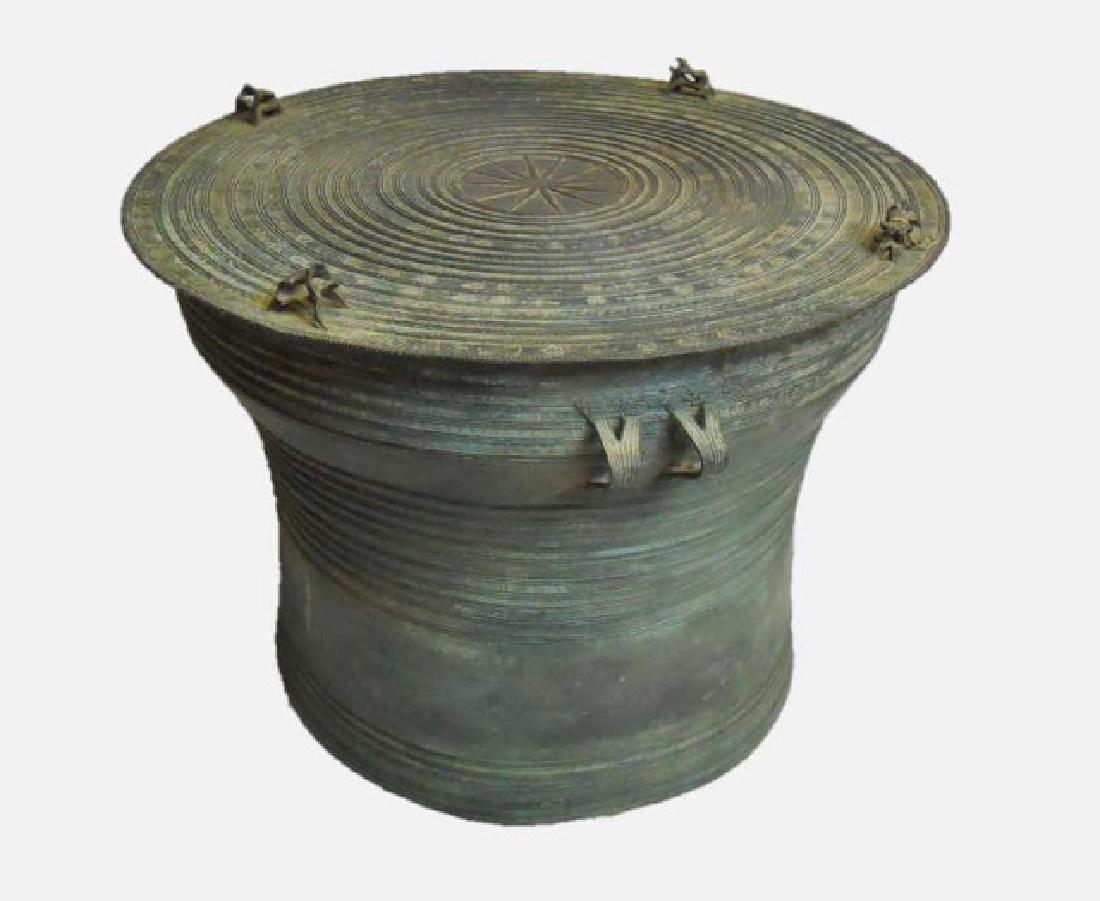 Antique Bronze Thai Rain Drum, Medium Size: Herger type II bronze rain drum with four single frog figures,central eight-point star decoration and profuse stamped designs at top. Deep verdigris patina. Wear consistent with age and use. Measures 