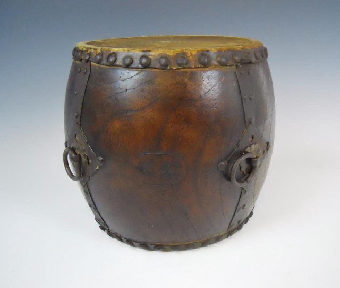Antique Japanese Taiko Ceremonial Drum: Antique Japanese Taiko drum constructed of Keyaki wood and leather, with cast iron handles and studded flanges at top and bottom. Wear consistent with age and use. Leather is well worn but intact. Sta