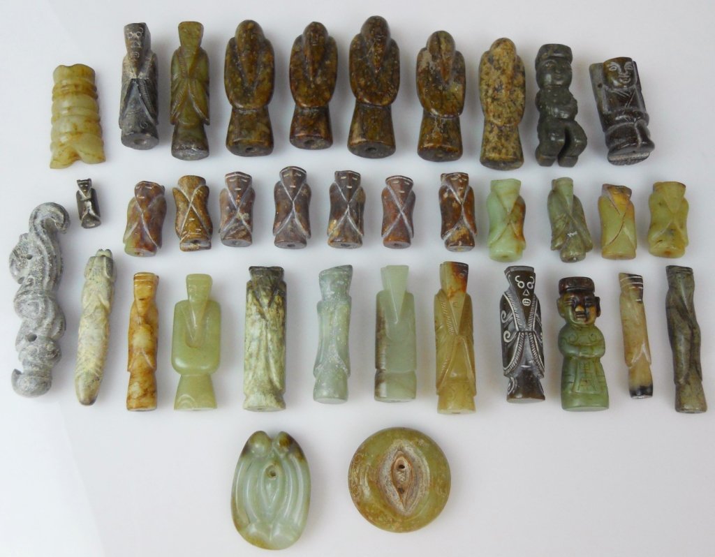 Chinese Carved Jade & Hard Stone Figures (36): Collection of thirty-six antique and vintage Chinese carved jade and hard stone figures worked as beads and toggles of various shape and size. Longest measures 3\" in length.