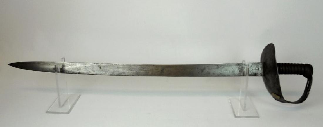 Model 1845 British Royal Navy Cutlass, HEIGHINGTON: British M1845 Royal Navy Cutlass with heavy curved blade without fuller. Blade marked at ricasso with crown over "E9" and "WD" with broad arrow, reverse with "C/89" blade spine additionally signed, "H