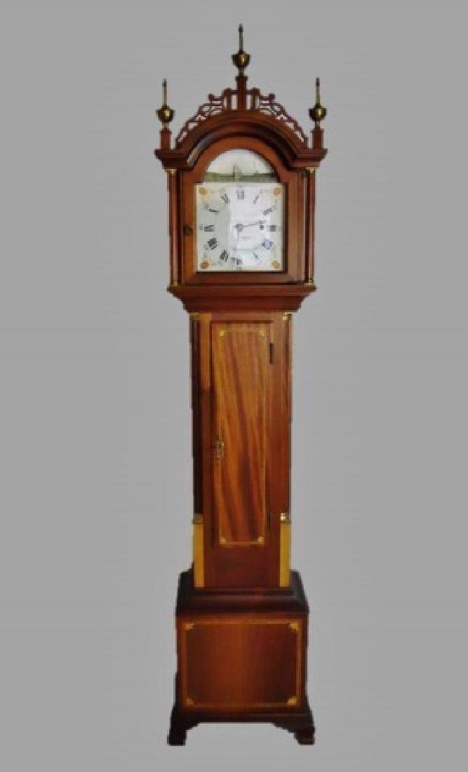 Mahogany Cased Dwarf Clock , Elmer O. Stennes: Dwarf clock with eight day movement mahogany Roxbury case, having satinwood inlay with open fretwork glazed hood with gilt brass finials. Face with Roman numeral radial dial and ship movement, signed 