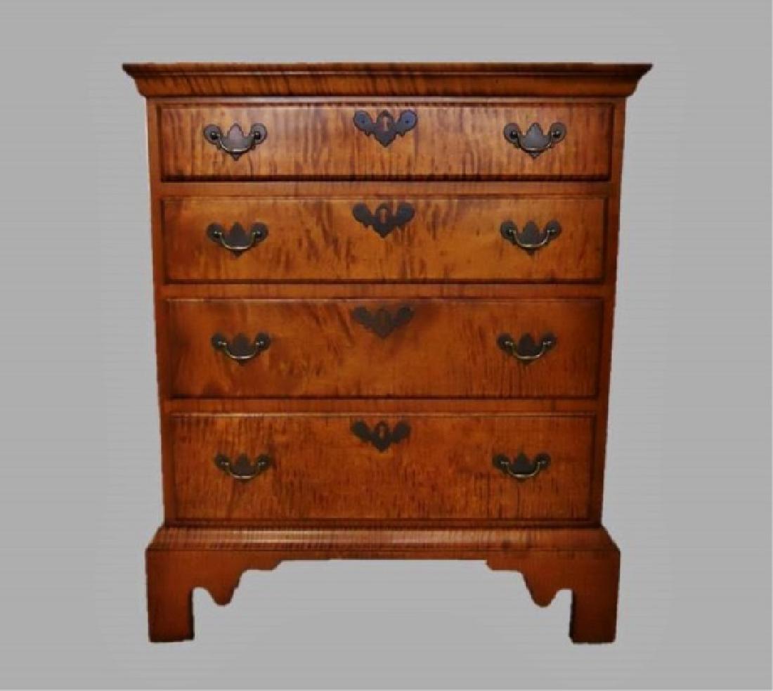 Contemporary Tiger Maple Chest, Eldred Wheeler: Faithful contemporary reproduction of 18th C. four drawer chest in tiger maple, signed "Eldred Wheeler, Hingham Mass". Chest constructed in highly figured tiger maple, having four drawer case with dov