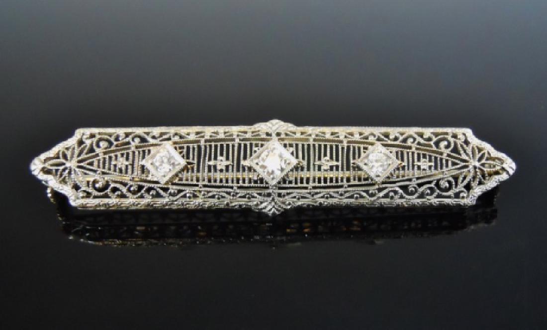 14K Gold Platinum Diamond Bar Pin: 14K White Gold and Platinum bar pin with filigree decoration, set with three round cut diamonds of good quality and color. Pin measures: 2.25" L, total weight: 4.6 g, 2.9 dwt.