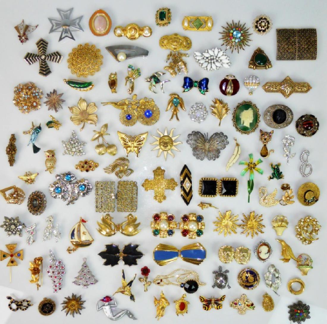 Collection of Costume Jewelry (107pc): Collection of pins in various forms, both flora and fauna including bees, birds, fish, cats as well as figural, cameos, enamels, filigree, crystal and more. Geometrics and various cross forms in both