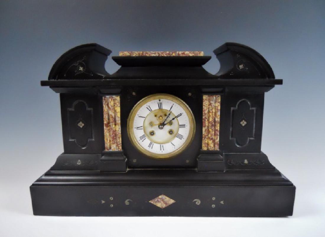 Antique French Slate Mantel Clock, Jappy Freres: 19th C. Large French mantel clock. Case in polished slate with incuse carved decoration and inlaid stone. White porcelain face with Roman numeral radial dial, gilt indicator hands and exposed escapeme