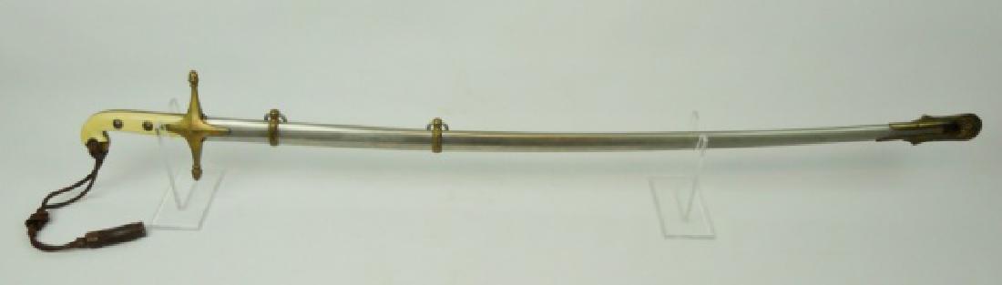 USMC Officers Sword, General Charles Wynn: Sword belonging to Brig. General Charles Arthur Wynn, USMC. Early 20th C. USMC officer's mameluke style dress sword. Double etched blade personalized, "CHARLES ARTHUR WYNN". Sword with steel scabbard