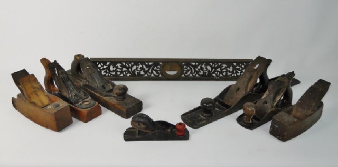 Collection of Antique Tools, (8pc): Collection of Antique tools: (1) Level, reticulated iron frame with adjustable brass level signed, "L.L. Davis" (2)19th C. wood block planes, (2) Unsigned wood and iron planes, (2) Stanley / Bailey pl