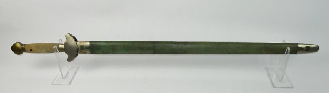 Early 20th C. Chinese Military Sword: Chinese sword with double edged straight steel blade with decorative etching. Nickel guard and pommel with white same grip. Scabbard in green shagreen with nickel throat and chape. Sword measures: 39"