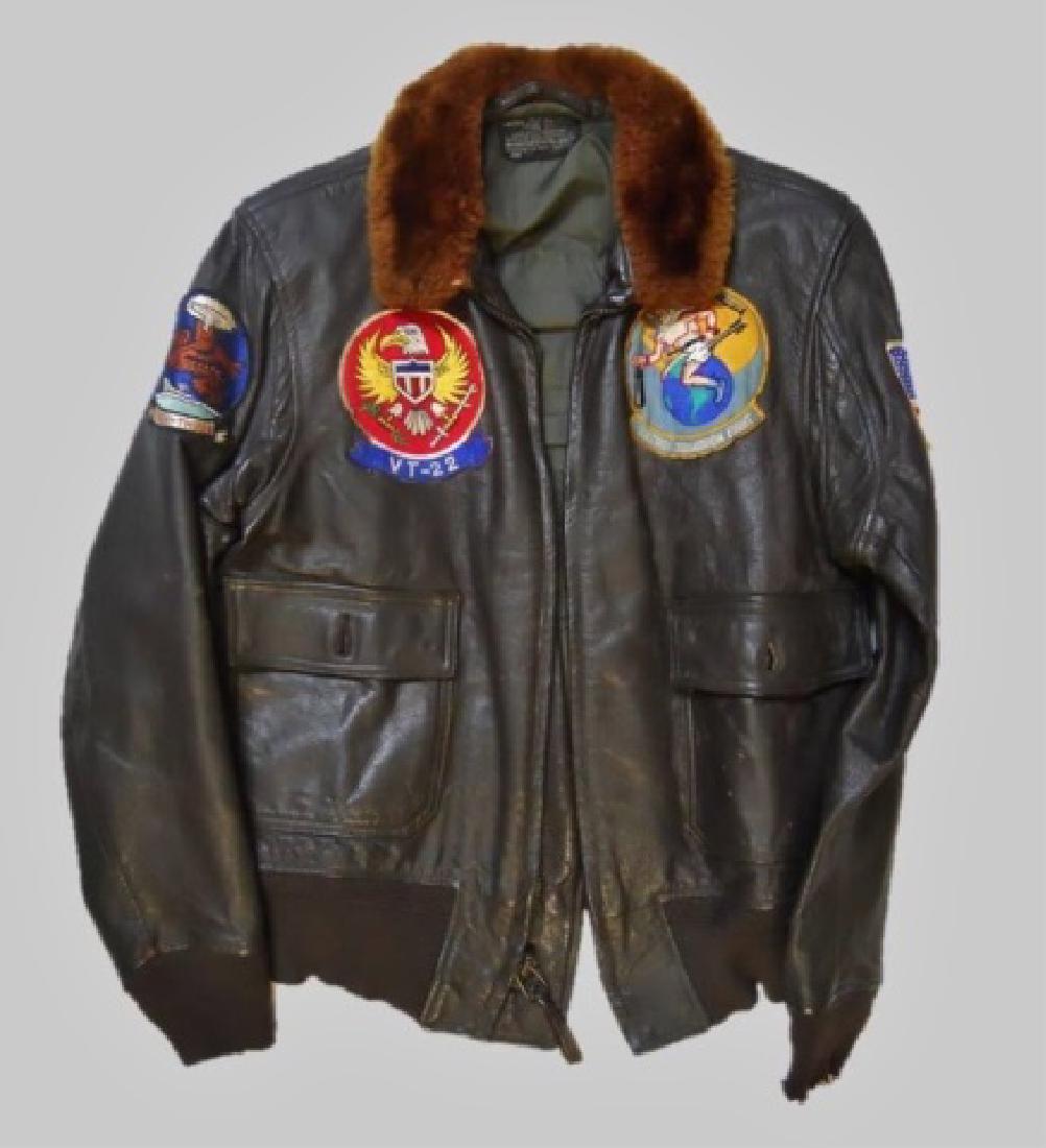 Korean War US Navy Flight Jacket Squadron Patches: Korean War era US Navy "Type 3" flight jacket with squadron patches. Leather construction, interior with label, "IRVIN B. FOSTER SPORTSWEAR Co", zipper signed "CONMAR". Exterior with eight patches: "P