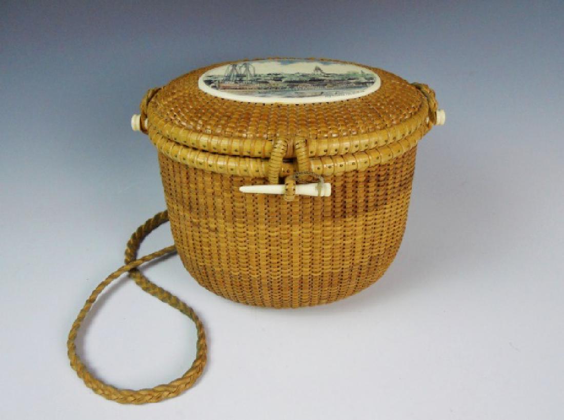 Vintage Nantucket Friendship Basket, G. L. Brown: Hand woven Nantucket Friendship Basket, signed interior base, "G. L. Brown Cross Rip Jr. Washington Ave, Madaket Nantucket". Basket with polychrome scrimshaw plate with skillful depiction of Nantucket