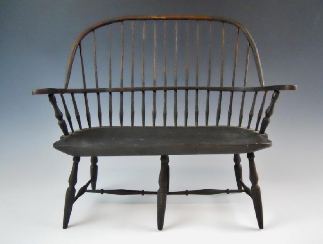 19th C. Painted Miniature Windsor Settle: 19th C. hand crafted and painted Windsor settle, likely a salesman's sample. Carved board seat with turned legs, carved arms and spindle back construction. Period surfaces with some wear, measures: 15