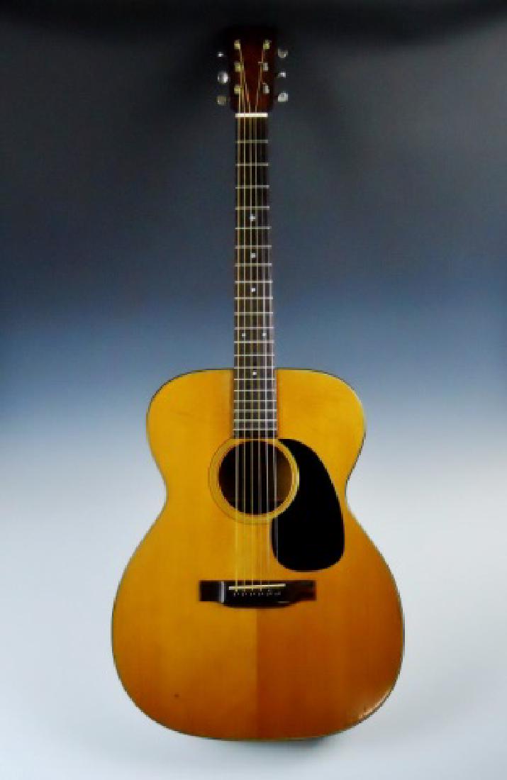 1969 C. F. Martin #00018 Acoustic Guitar: Acoustic guitar manufactured in 1969, C.F. Martin Nazareth, PA. Serial number: 252467. Crafted of spruce and mahogany wood with "C" neck and rosewood bridge. Guitar in excellent condition with light w