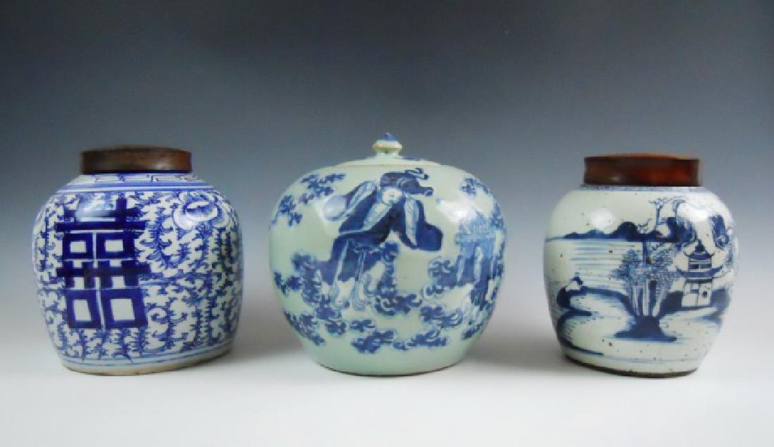 Chinese Blue and White Ceramic Ginger Jars, (3pc): Antique Chinese porcelain blue and white lidded ginger jars. Hand decorated in mythological themes, two with rosewood covers. Largest measures: 8" H