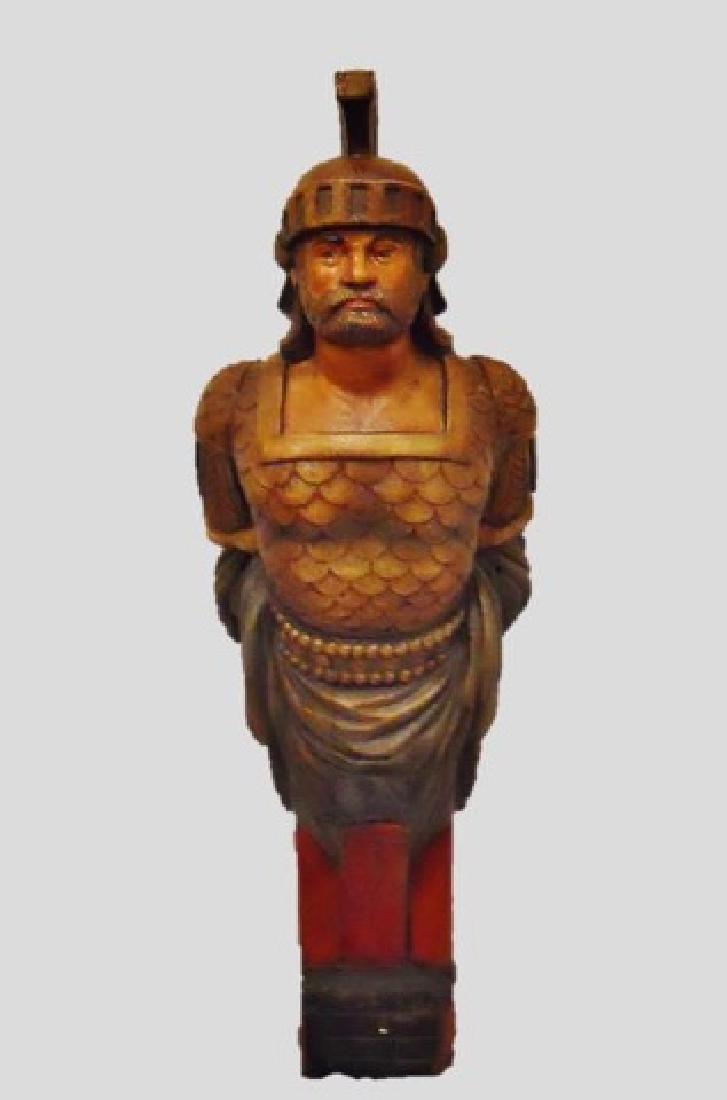 20th C. Hand Carved Wood Ship's Figure Head: Large hand carved and painted wood ship's figure head. Detailed carving of a classical warrior figure with helm and armor, measures: 58" H x 22" W.